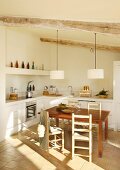 Dining area in rustic kitchen without wall units