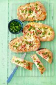 Wholemeal tarte flambée with cream cheese, onion and ham