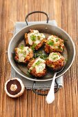 Baked portobello mushrooms stuffed with pork and beef