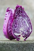 A red pointed cabbage sliced in half