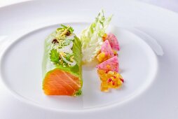 A Norwegian salmon roll with herbs and onion