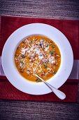 Butternut squah soup with almonds and Parmesan
