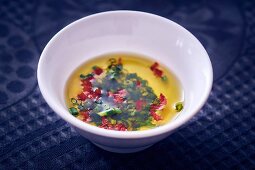 Vinaigrette with chives in a bowl