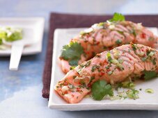 Steamed fillets of salmon with chilli and coriander