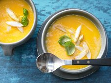 Creamy potato and carrot soup with white asparagus