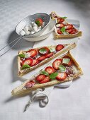 Puff pastry triangles with strawberries and mini mozzerella