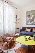 Retro furniture and cowhide rug in living room