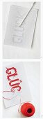 Cross-stitching a motto on perforated paper