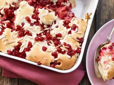 Redcurrant cake with almond slivers and allspice
