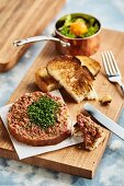 Beef tartare with toasted bread and salad