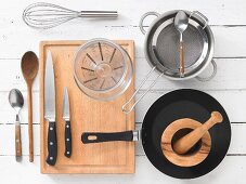 Kitchen utensils for making Asian fried noodles with sprouts and egg