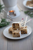 Stollen cubes on skewers for fondue