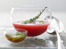 Spicy melon soup with spring onions and apple juice