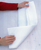 White napkin rolled as cutlery bag (3/5)