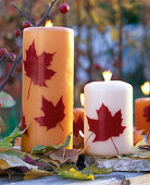 Decorate candles with wax leaves