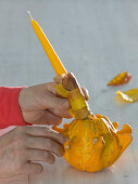 Ornamental pumpkin as candle holder (4/6)