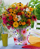 Late summer bouquet in colorful bag