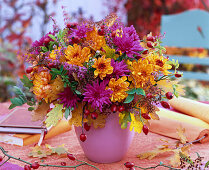 Autumn chrysanthemums and oak leaves bouquet