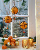 Oranges hung in the window