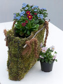 Moss bag with spring flowers (7/8)