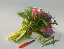 Tying a bouquet with tulips, hyacinths and ranunculus 4/5