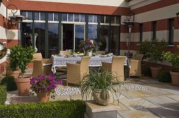 Terrace at the house with large seating group and patio heaters