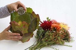 Dahlia bouquet in leaf vase (4/6)