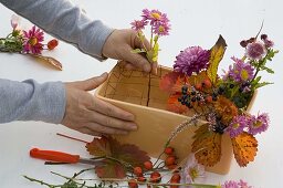 Autumn arrangement in ceramic jardiniere