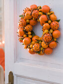 Scented door wreath of citrus (mandarin and kumquat)