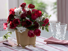 Red and white bouquet with Tulipa (tulips), Ranunculus (ranunculus)