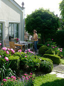 Terrace edged with form-cut Buxus