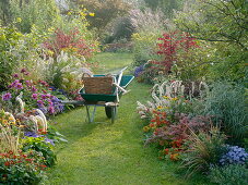 Autumnal beds with grasses, perennials, summer flowers and shrubs