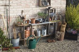 Potting area built from old wine crates and boards (5/5)