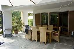 Seating group on paved terrace under roof