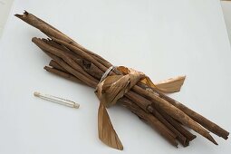 Unusual advent arrangement made of cinnamon sticks (2/5)