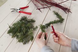 Stylised fir tree made of twigs as Advent calendar (4/6)