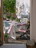 View of the spring terrace with a laid table