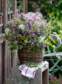 Meadow bouquet in basket vase