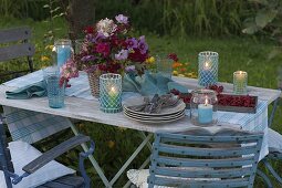 Setting a table under an apple tree