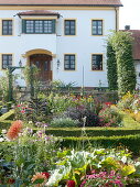 Artist's garden: View from the cottage garden to the house