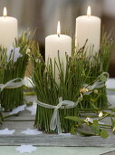 Unusual Advent wreath with candles wrapped in with Pinus