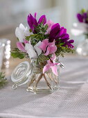 Small bouquet of cyclamen and herbs