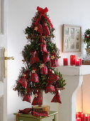Stylised Christmas tree of birch brushwood as Advent calendar