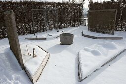Trapeze beds covered with snow in winter