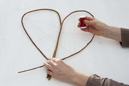 Wicker heart with red rose