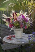 Autumn bouquet on a table in the garden