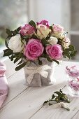 Bouquet of pink (roses) and Viscum album (mistletoe)