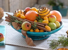 Christmas scented bowl with oranges, oranges spiked with cloves