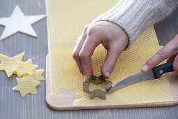 Cutting out stars from beeswax 2/3
