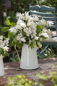 White scented bouquet of Syringa (lilac) and Aquilegia (columbine)